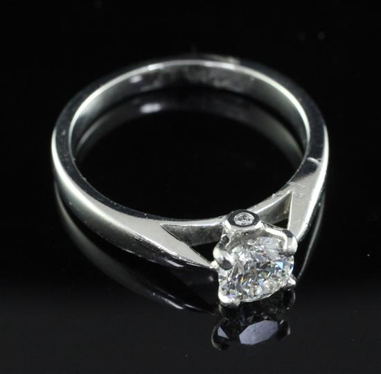 A platinum and single stone diamond ring, size K.